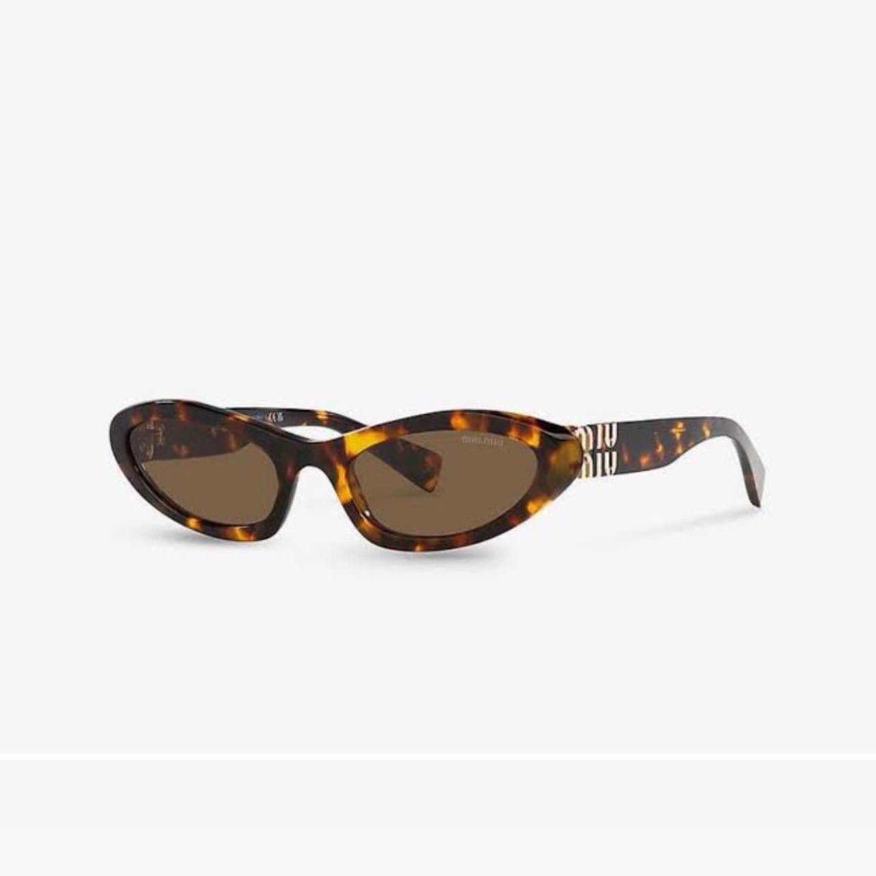 MIU MIU 09YS/1425S0
MIU MIU